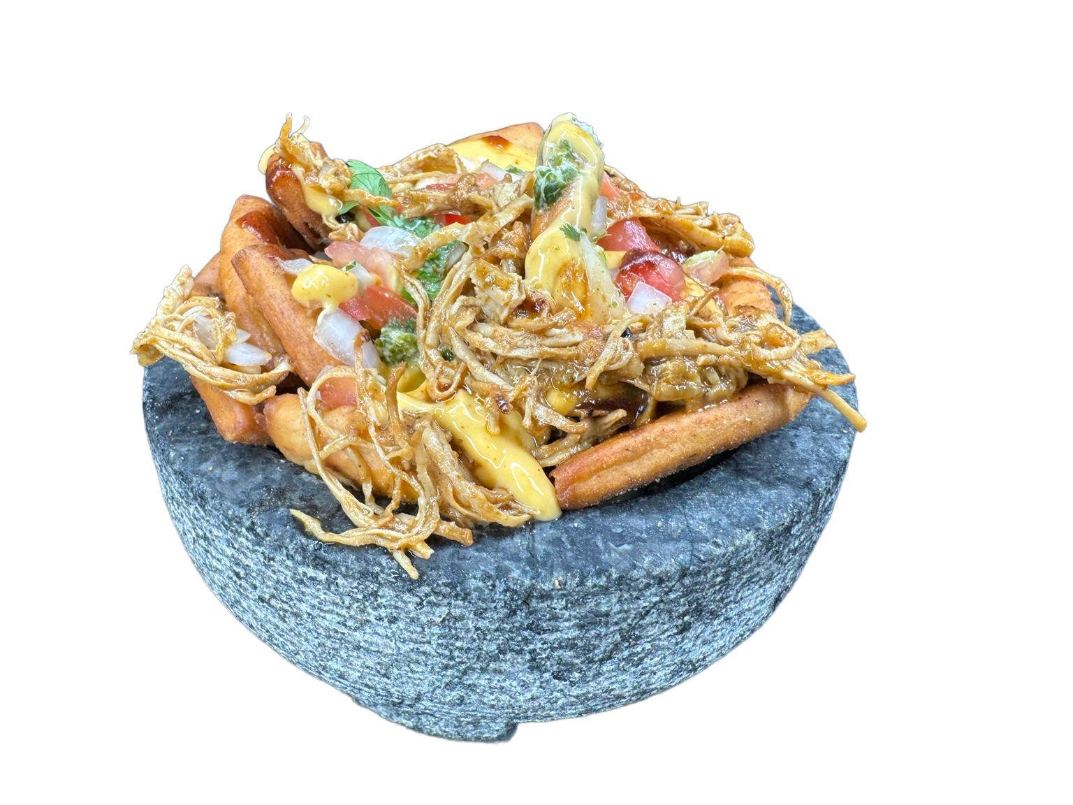 Dibba Naanchos served in a stone bowl, with toppings and sauces